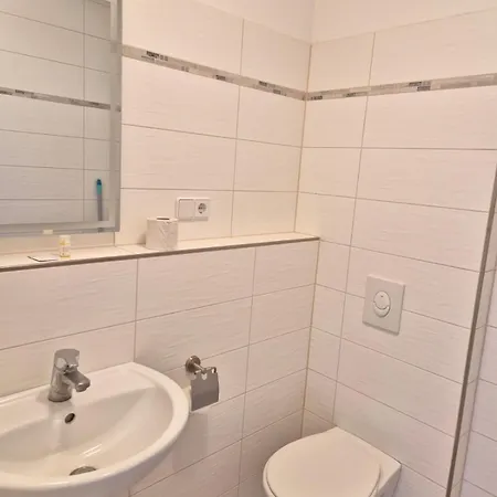 Gastem Ug Quarto em Acomodações Particulares